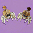 Laser cut acrylic jumping spider dangle earrings, closeup.