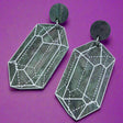 Close up image of variation 1 in crystal design laser cut acrylic earrings.