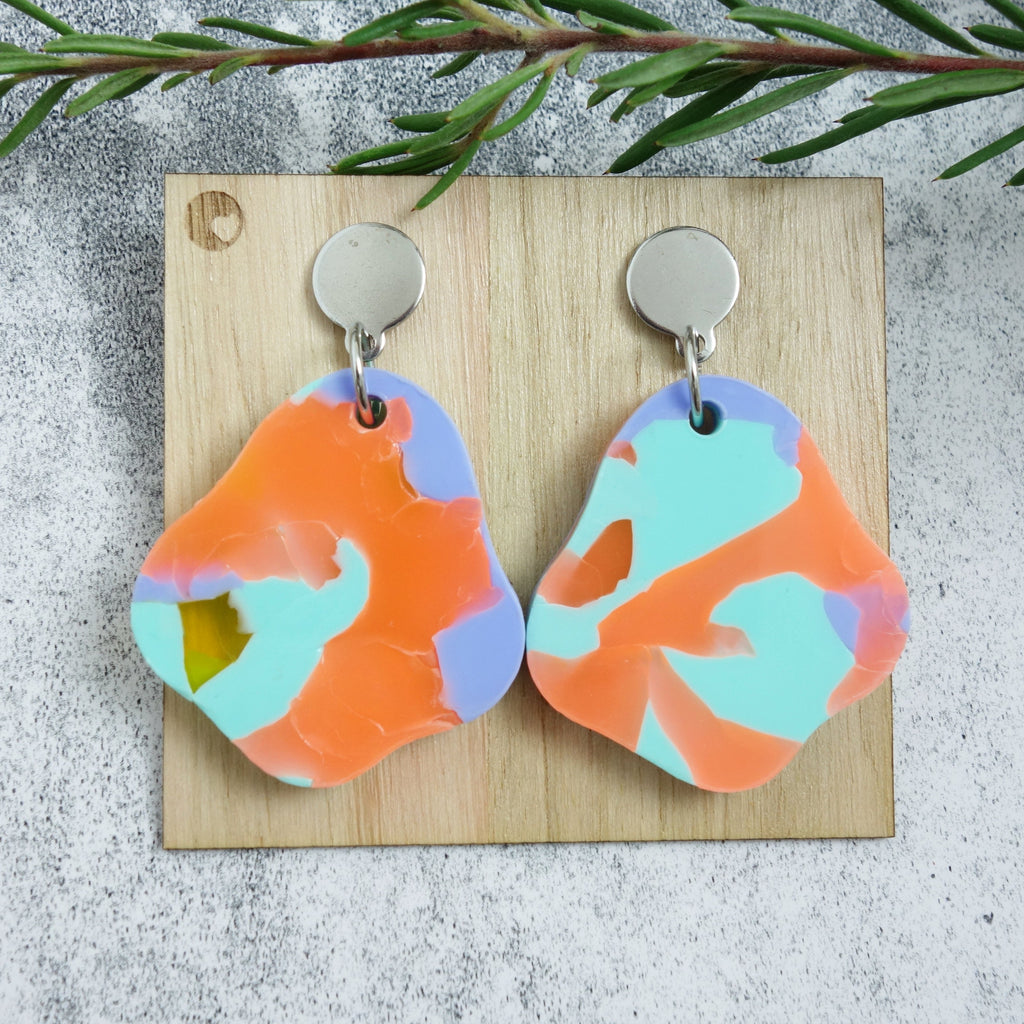 Organic shaped one-of-a-kind recycled acrylic earrings with stainless steel toppers. 