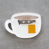 Back view of Earl Grey Tea Acrylic Brooch Pin, showing the stainless steel brooch pin.