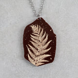 Acrylic fern leaf pendant necklace with stainless steel necklace chain. 