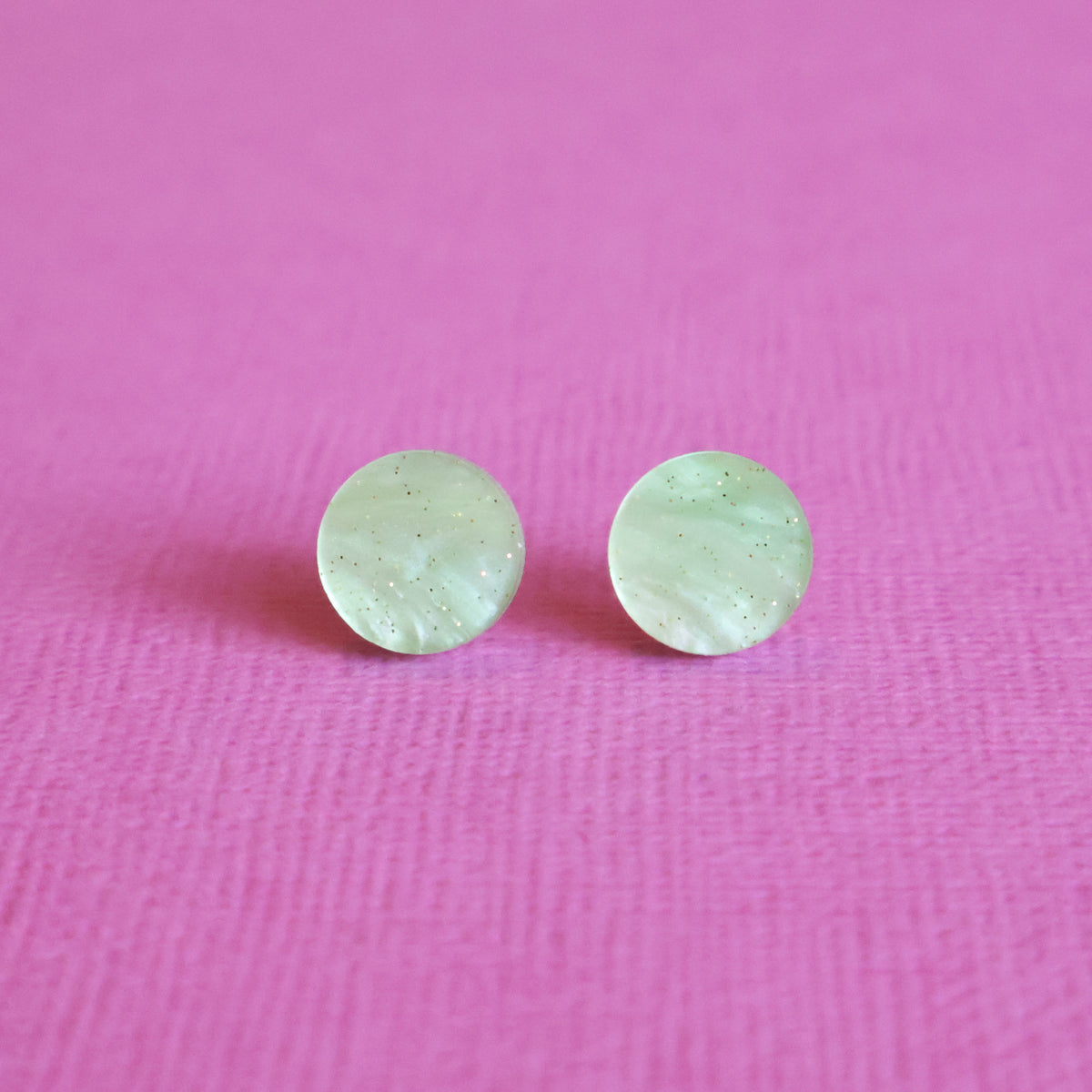 Acrylic Apple green studs closeup