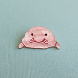 Acrylic pink blobfish brooch closeup
