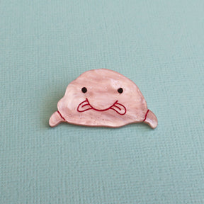 Acrylic pink blobfish brooch closeup