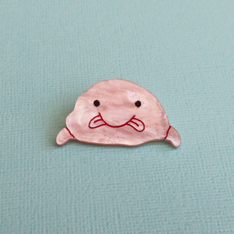 Acrylic pink blobfish brooch closeup