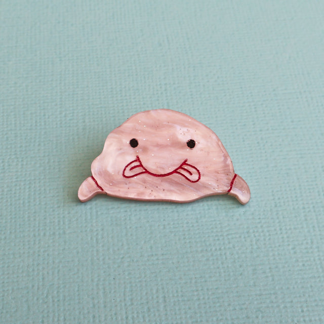 Acrylic pink blobfish brooch closeup