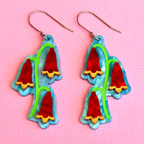 Christmas bells earrings closeup