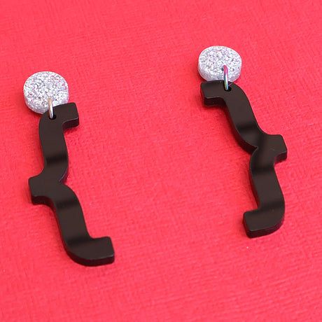 Curly bracket earrings angled view