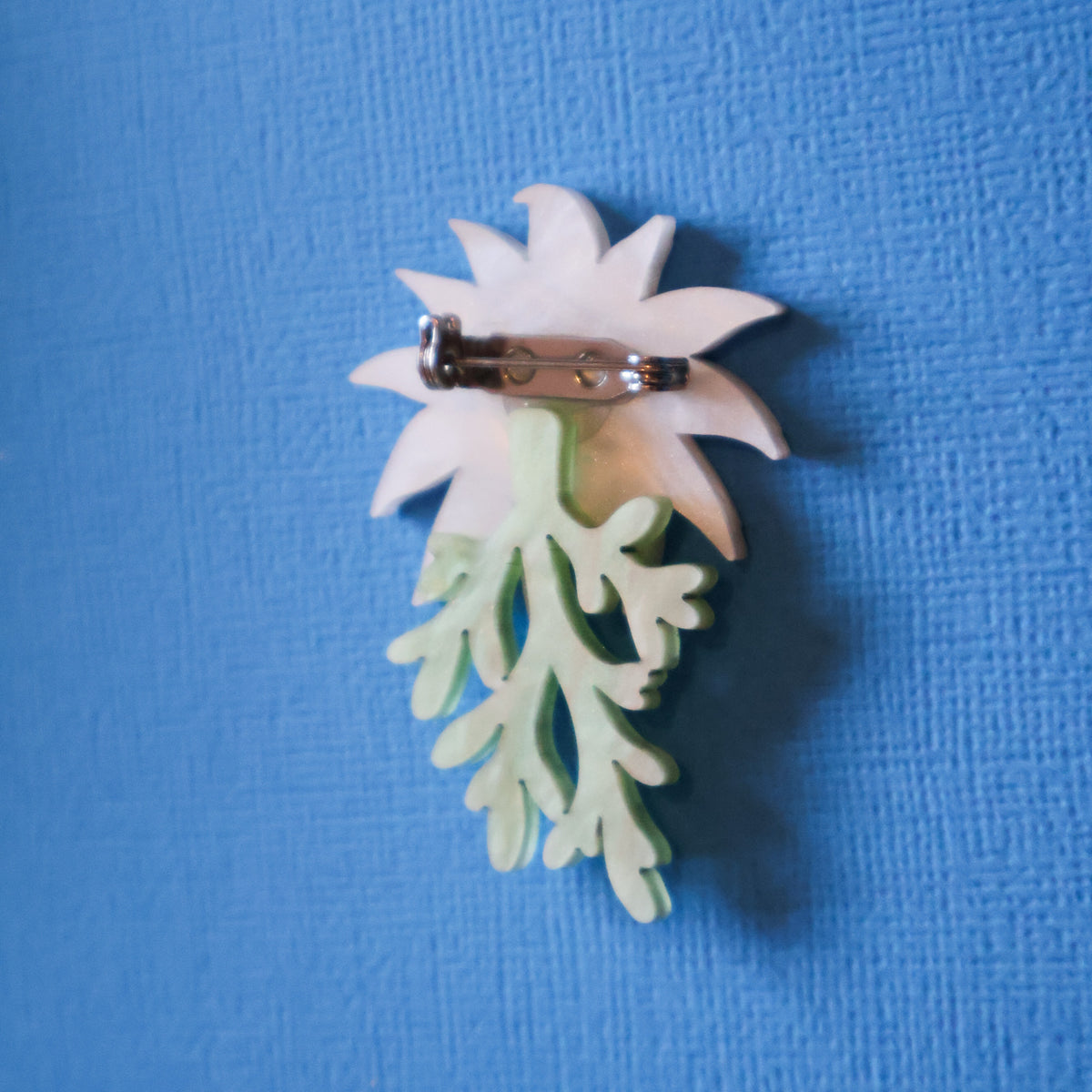 Flannel flower brooch back view  showing stainless steel clasp.