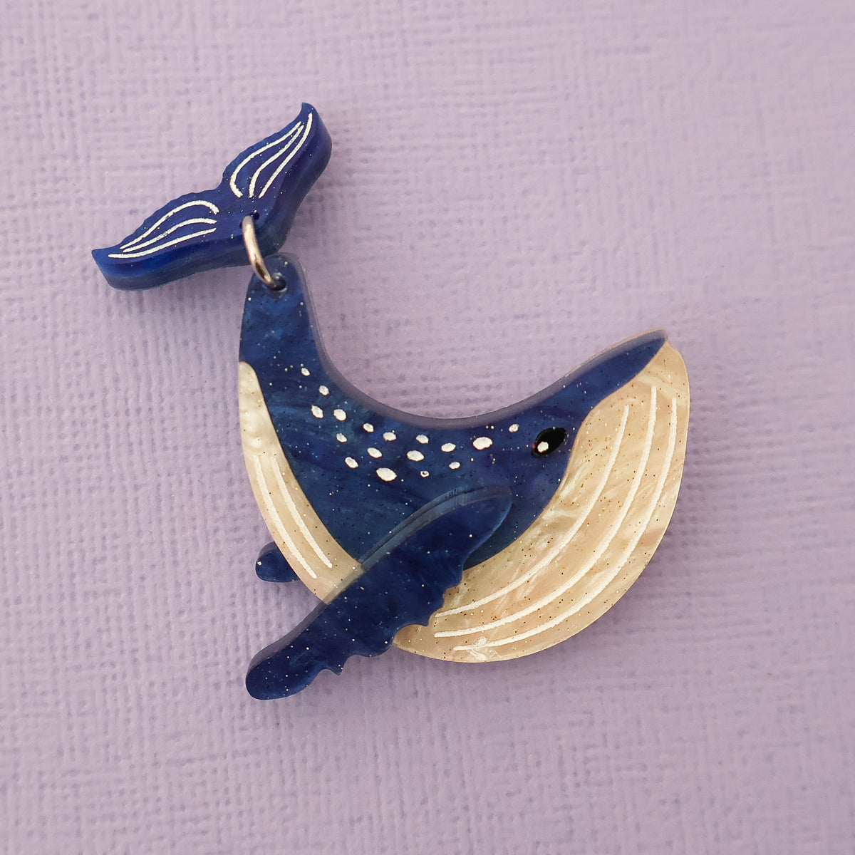 Acrylic humpback whale brooch closeup