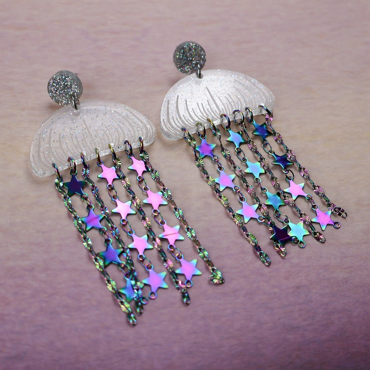 Glittery Acrylic jellyfish earrings with rainbow star chain.