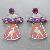 Pair of earrings with UFO design and kangaroo design in iridescent 'tractor' beam