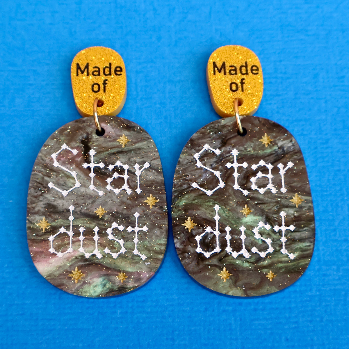 Made of Stardust earrings closeup
