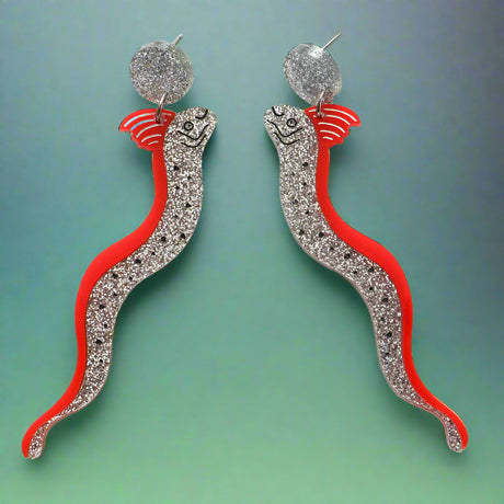 Pair of long statement sized oarfish acrylic earrings with red and silver bodies