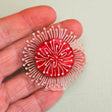 Pincushion Hakea brooch in hand