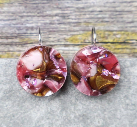 A pair of one of a kind round recycled acrylic earrings with stainless steel french hooks and pink and brown acrylics titled  'Dusky Petals'. Pair 101-06