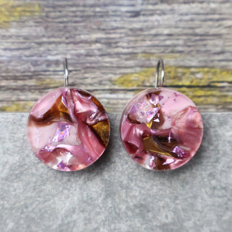A pair of one of a kind round recycled acrylic earrings with stainless steel french hooks and pink and brown acrylics titled  'Dusky Petals'. Pair 101-20