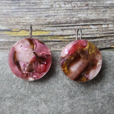 A pair of one of a kind round recycled acrylic earrings with stainless steel french hooks and pink and brown acrylics titled  'Dusky Petals'. Pair 101-16