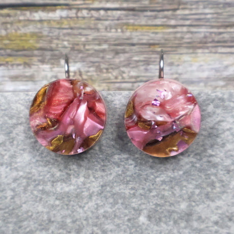 A pair of one of a kind round recycled acrylic earrings with stainless steel french hooks and pink and brown acrylics titled  'Dusky Petals'. Pair 101-12