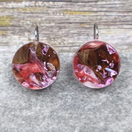 A pair of one of a kind round recycled acrylic earrings with stainless steel french hooks and pink and brown acrylics titled  'Dusky Petals'. Pair 101-13