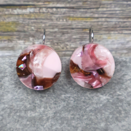 A pair of one of a kind round recycled acrylic earrings with stainless steel french hooks and pink and brown acrylics titled  'Dusky Petals'. Pair 101-14