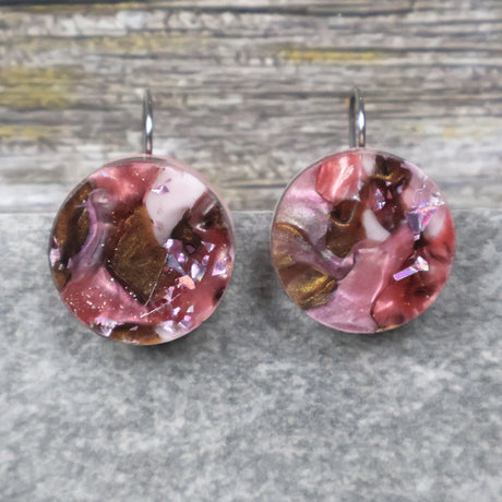 A pair of one of a kind round recycled acrylic earrings with stainless steel french hooks and pink and brown acrylics titled  'Dusky Petals'. Pair 101-15