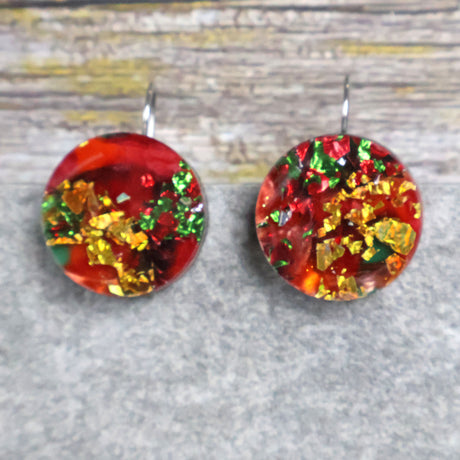 A pair of round recycled acrylic Christmas earrings with red, green, and gold colors, mounted on stainless steel french hooks. Pair 107-10