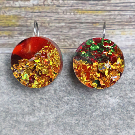 A pair of one of a kind recycled acrylic round earrings with stainless steel french hooks, in Christmas coloured acrylics. Pair 107-12