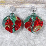 A pair of one of a kind recycled acrylic Christmas bauble earrings with stainless steel toppers, featuring a red, green and gold acrylic design. Pair 108-01