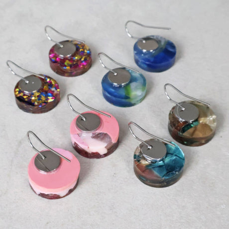 Image showing the back of small round earrings with stainless steel french hooks