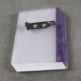 Back view of a Science textbook Acrylic brooch showing stainless steel brooch pin