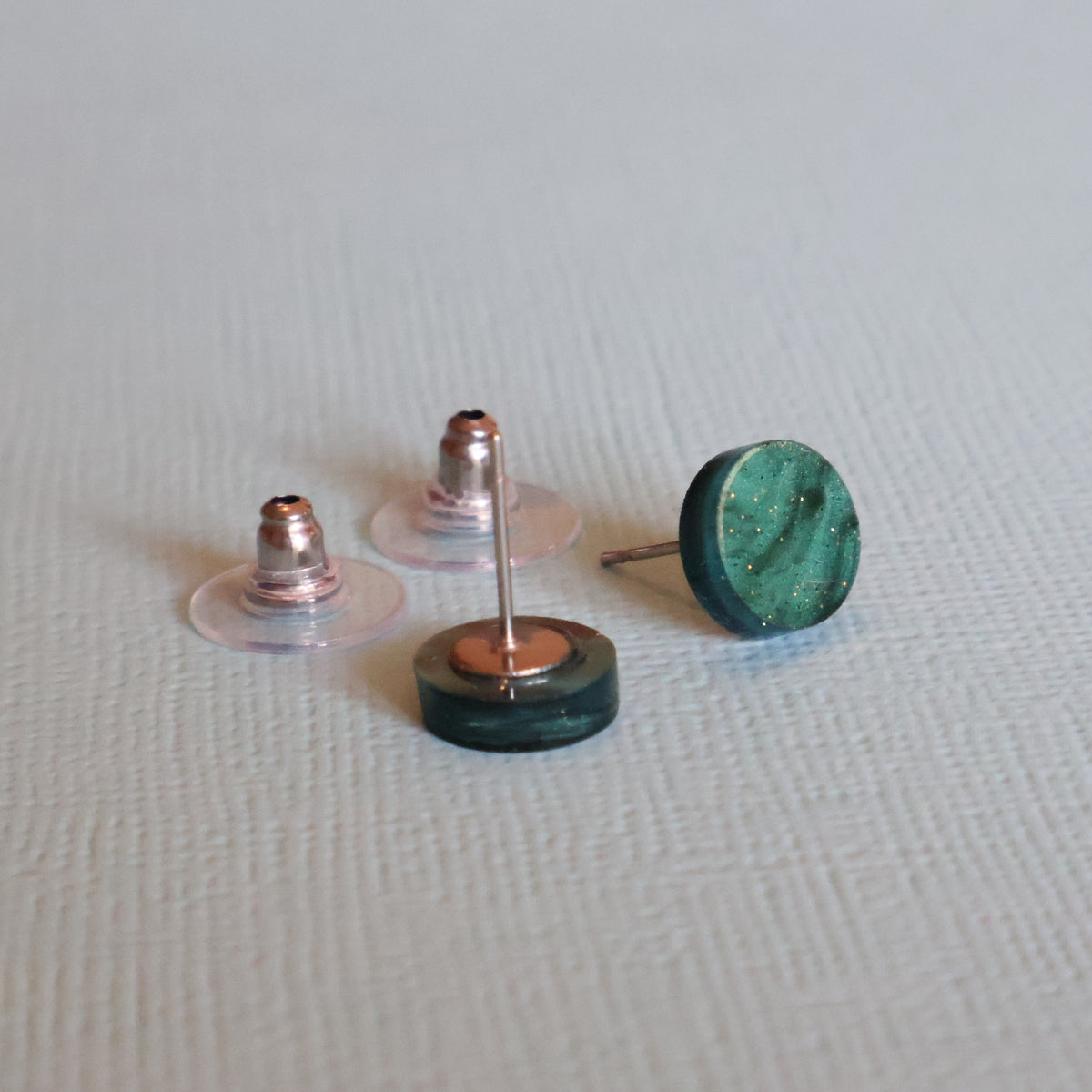 Studs showing ear nuts