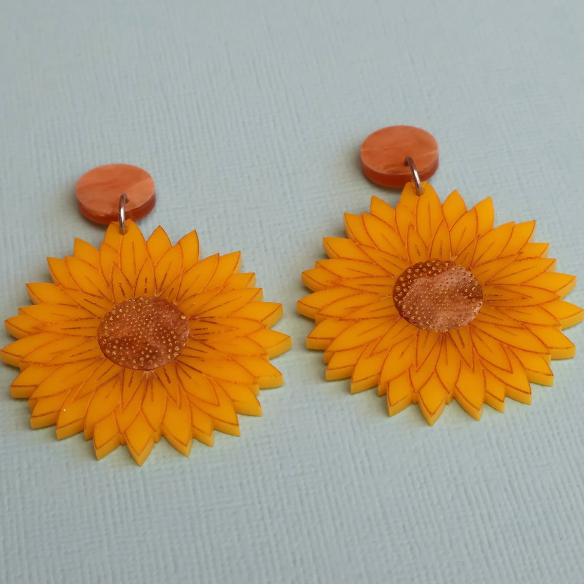 Flannel flower earrings angled view