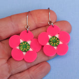 Tea tree merinda earrings in hand