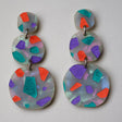 Terrazzo dangle acrylic earrings in orange, purple and teal tones. Dangles are 3 components and statements sized. 
