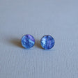 Round Twilight toned acrylic studs closeup