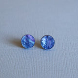 Round Twilight toned acrylic studs closeup