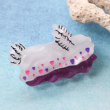 Small white purple and pink acrylic nudibranch brooch