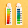 pH indicator earrings closeup