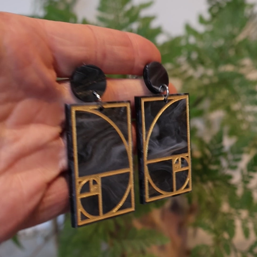 Closeup Video of Acrylic golden ratio earrings by Oh Pluto