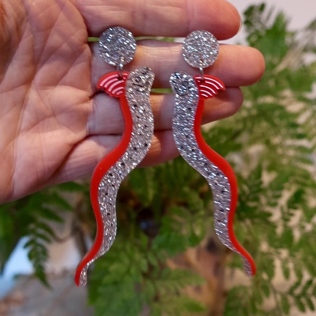 Closeup Video of Acrylic oarfish earrings by Oh Pluto