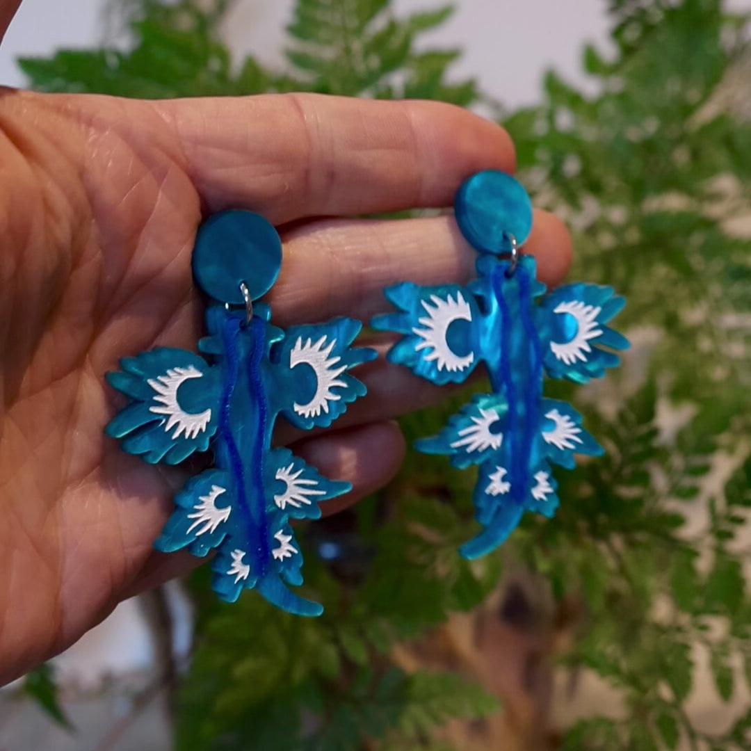 Closeup Video of Acrylic blue dragon sea slugs earrings by Oh Pluto