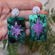 Closeup Video of Acrylic purple and teal star earrings by Oh Pluto