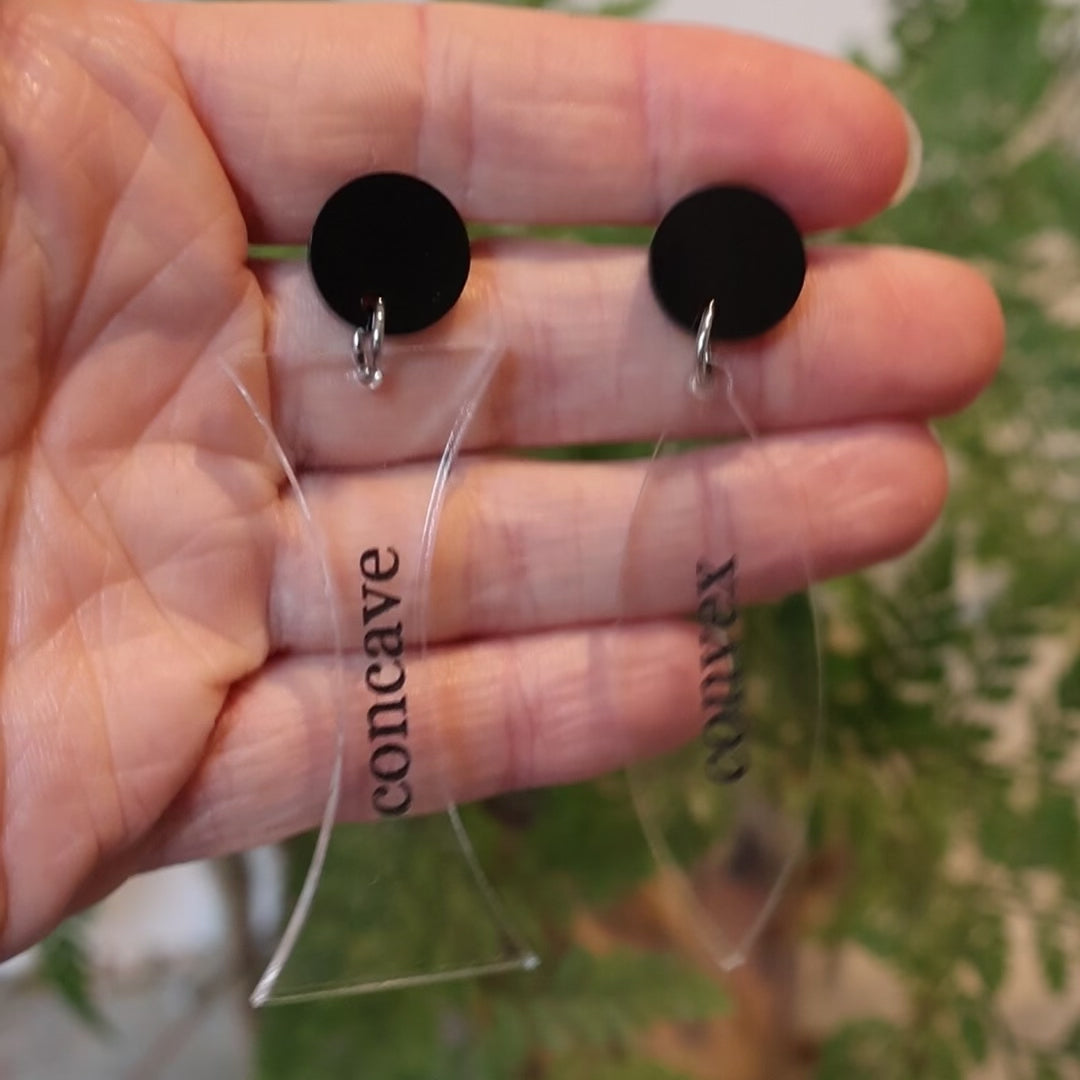 Closeup Video of Acrylic concave and convex earrings by Oh Pluto