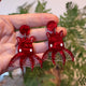 Closeup Video of Acrylic vampire squid earrings by Oh Pluto