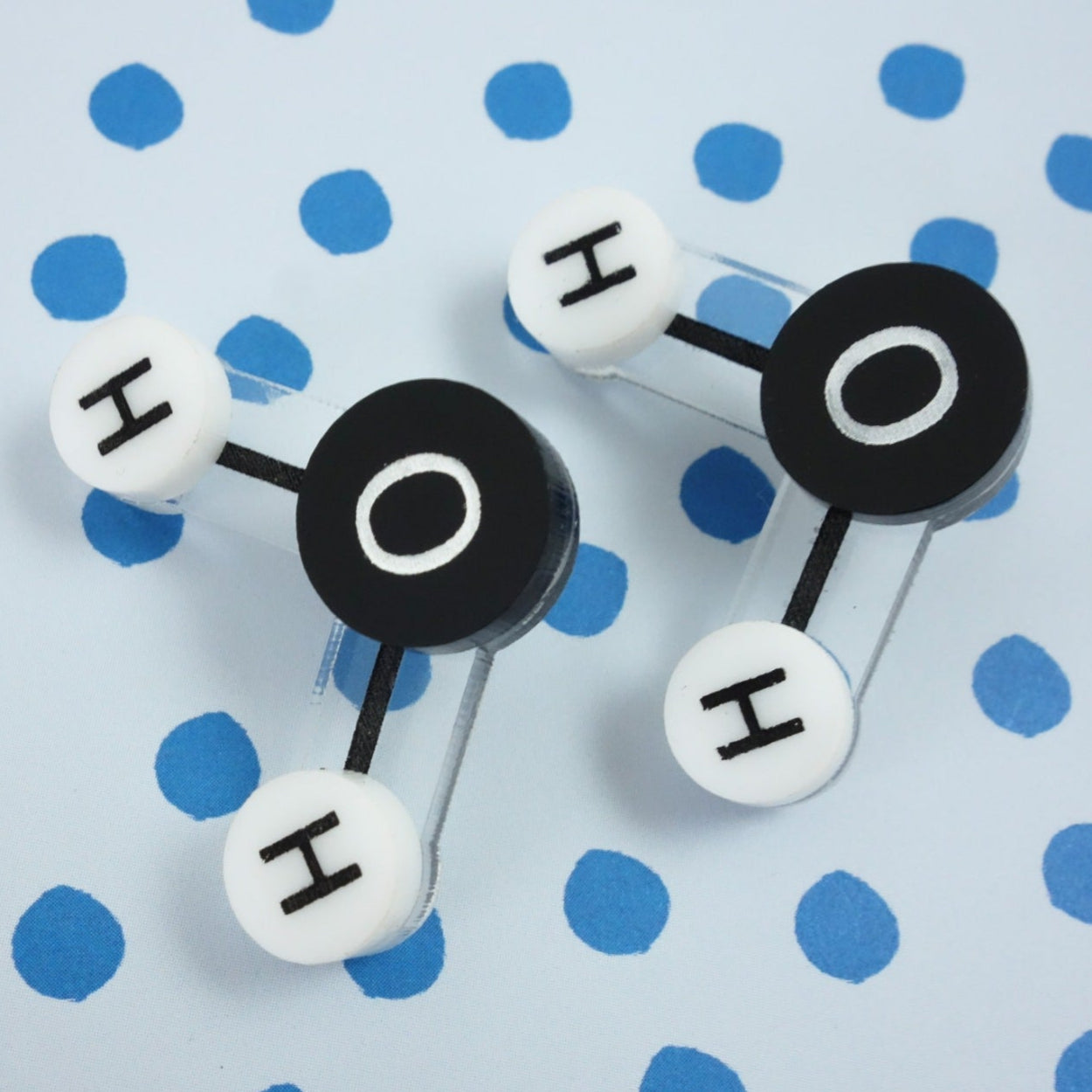 Laser Cut Acrylic Water Molecule Earrings. Ball and Stick Molecule with Oxygen and Hydrogen Atoms. Black and White Colourway. 