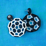 Black and white bucky ball earrings in laser cut acrylic