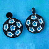 Black and white bucky ball earrings in laser cut acrylic