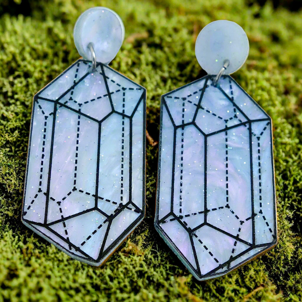 Close up image of variation 1 in crystal design laser cut acrylic earrings. 