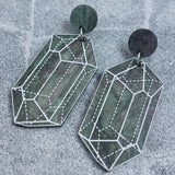 Close up image of variation 1 in crystal design laser cut acrylic earrings.